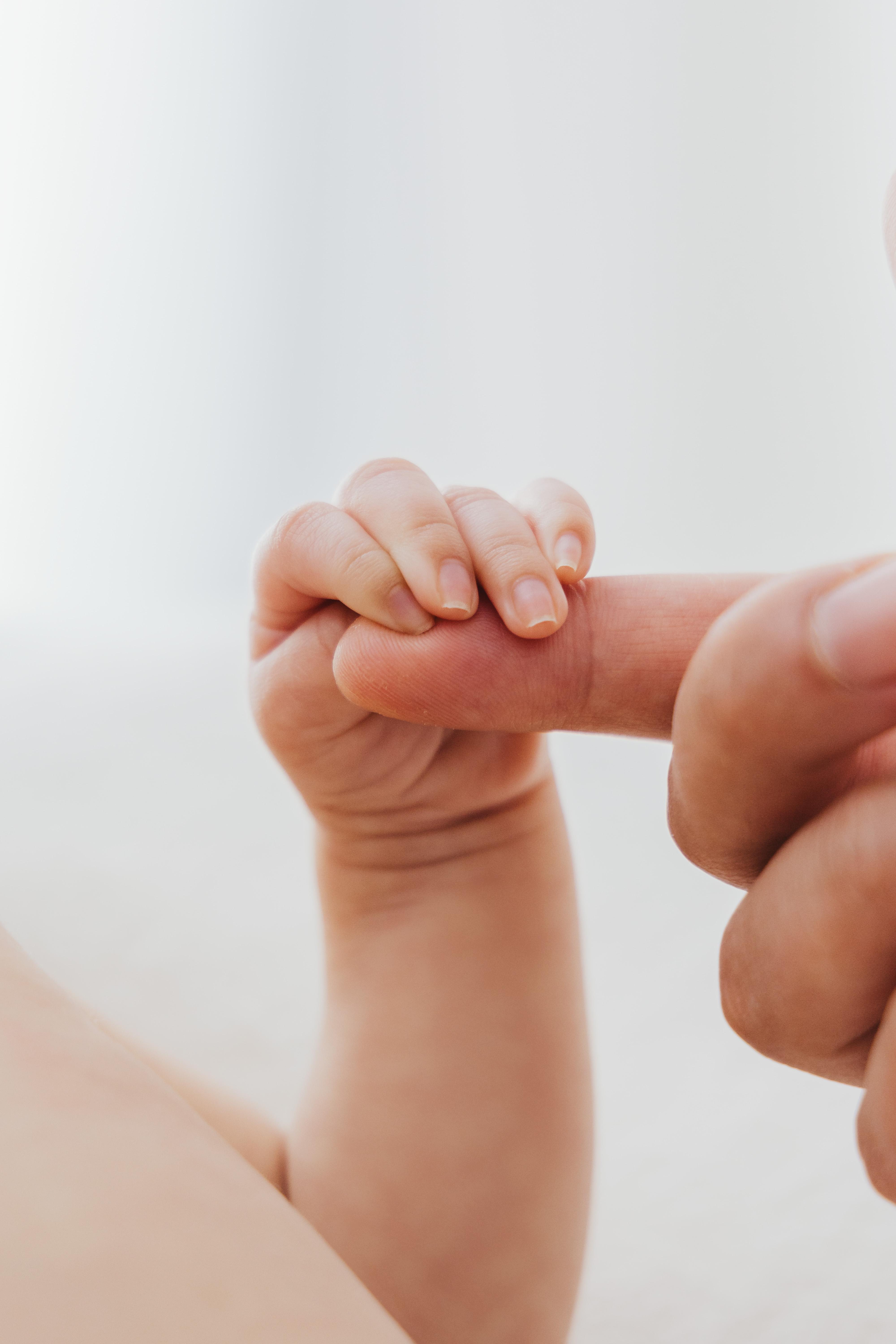 Wide-awake newborn baby with mouth open — real, unposed moment captured at Oana Maria Photography Rugby